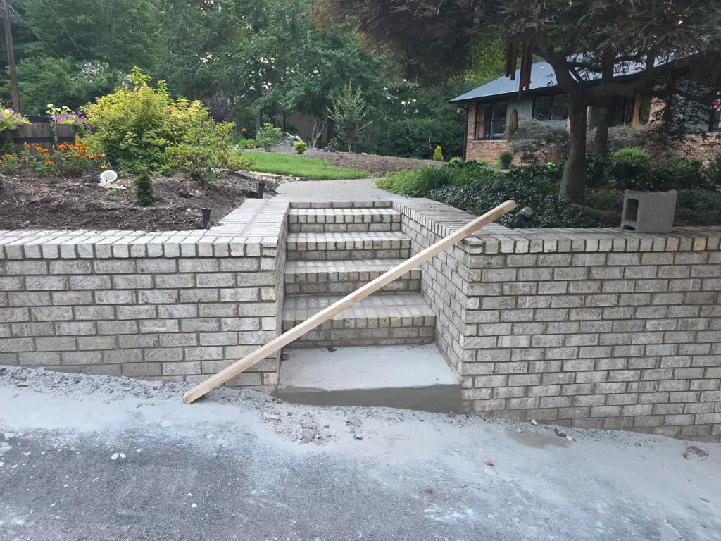 Brick steps with a poured concrete landing in Knoxville, Tennessee