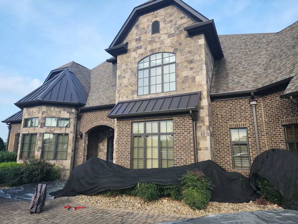 Craftsman home with a completed shingle roof in East Tennessee
